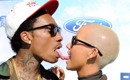 Amber Rose Swaps Tattoo of Wiz Khalifa for One of Another Famous Man  E  Online