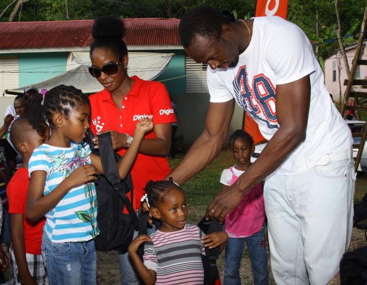 Usain Bolt Gives His Home Community Christmas Treat [PHOTO] Urban Islandz