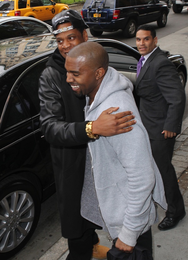 Kanye West and Jay-Z hug