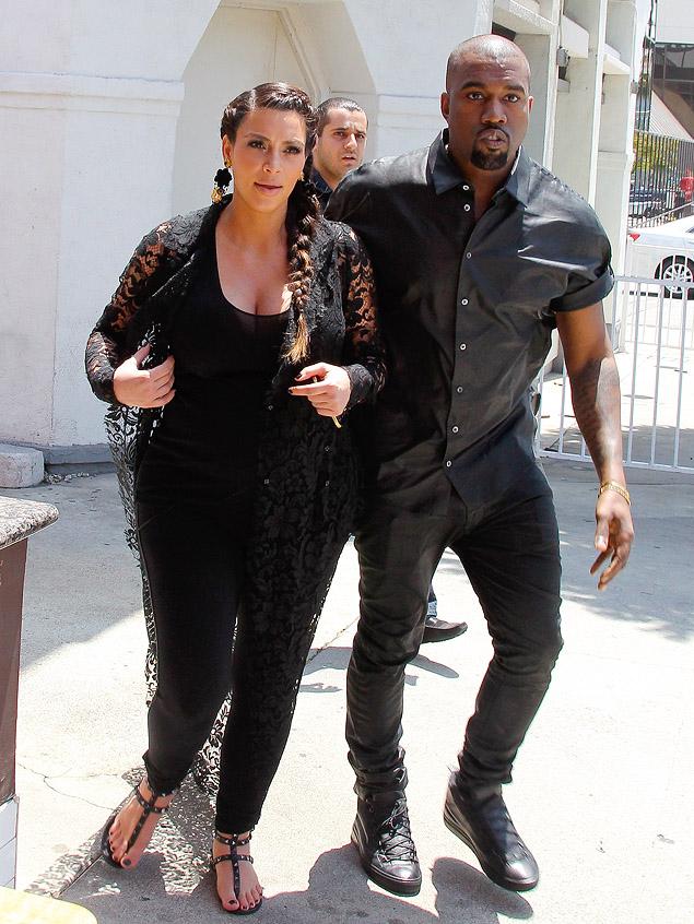 Kim and Kanye bump head