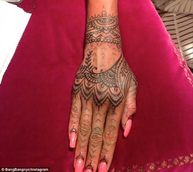 Rihanna hand tattoo