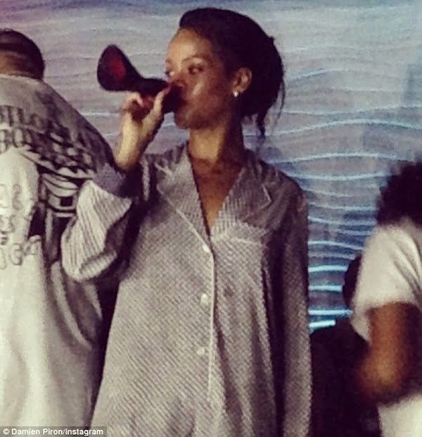 Rihanna drinking from stilleto