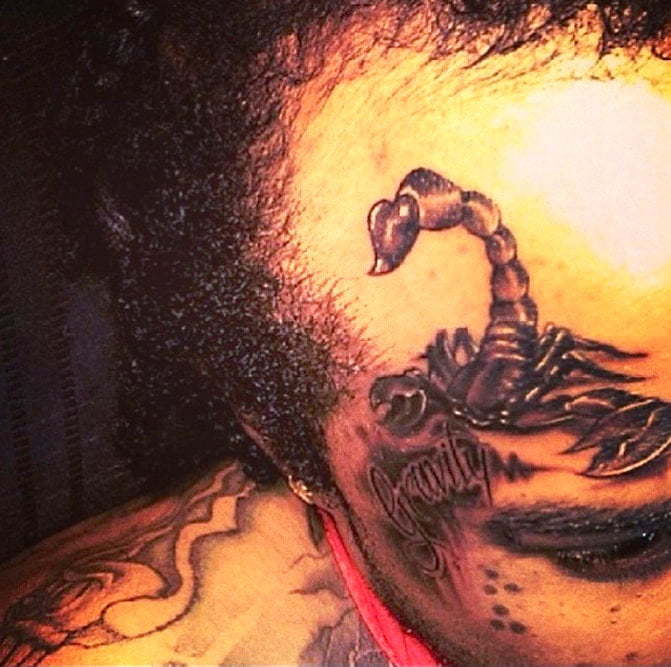 Tommy Lee Scorpion Face Tattoo