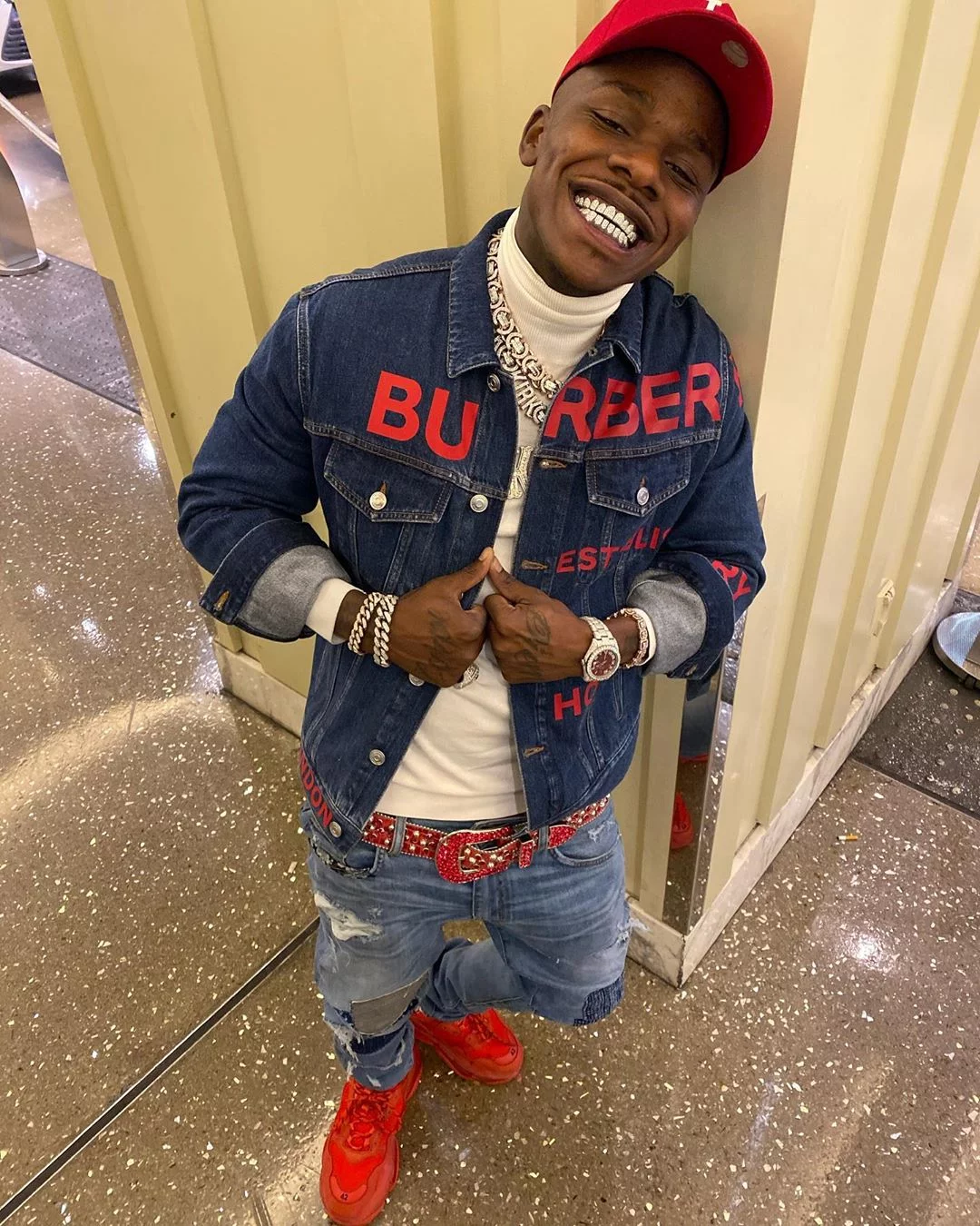 Mitchell & Ness Dolphins Split Home and Away Jersey of DaBaby on the  Instagram account @dababy