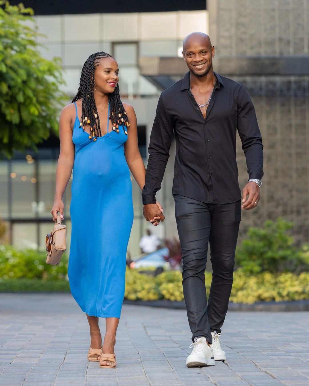    Asafa Powell med älskvärd, Fru Alysia Miller 