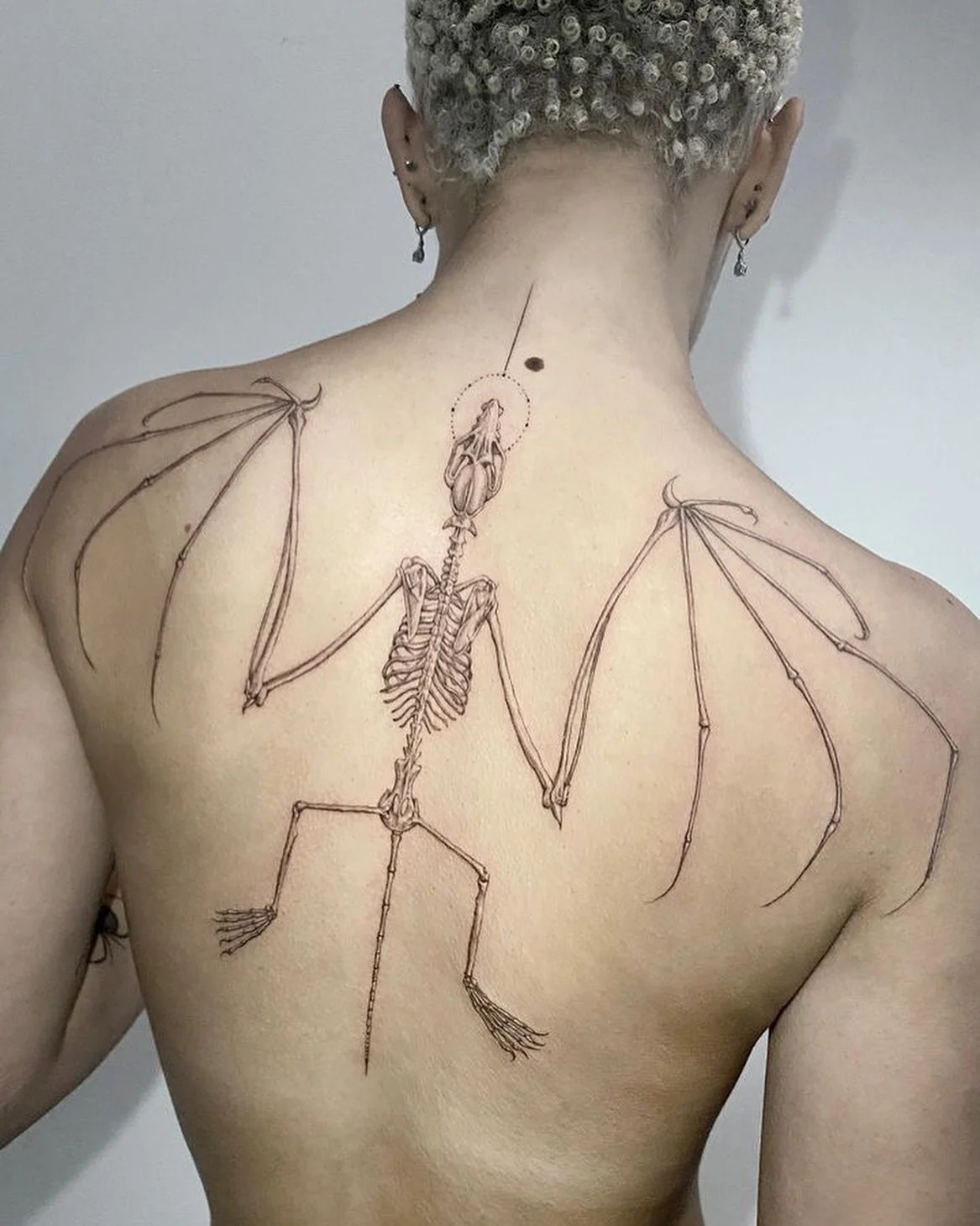 skeleton wing tattoos